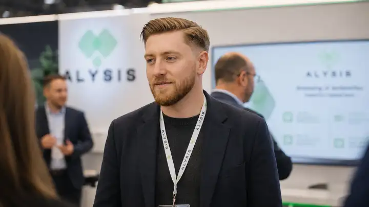 Alysis team member at an industry event