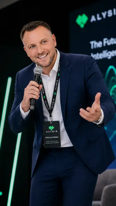 Marcus Zelden speaking on stage